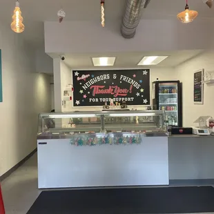 a man standing in front of a counter