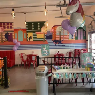 a table and chairs in a restaurant