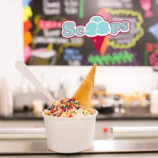 Unicorn Bowl!!! Ice cream, whipped cream, sprinkles and the cone on the top!!!!