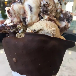 Double -PB chocolate and exhausted parent on a chocolate dipped waffle cone