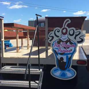 Sit in the back of an old truck and enjoy your ice cream.