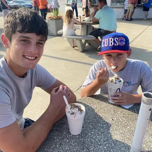 two boys eating ice cream