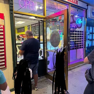 Order your ice cream at the window- can't go in! There are a couple of tables with chairs to sit outside.