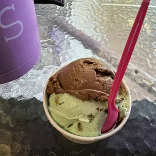 Scoop of pistachio and a scoop of peanut butter cups
