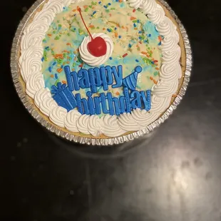a birthday cake with a cherry on top