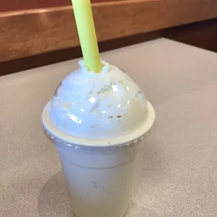 Malt with whipped cream.