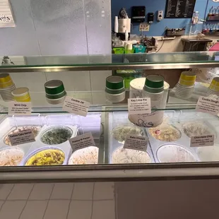 a variety of food items in a display case