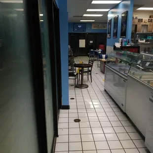 the inside of a deli shop