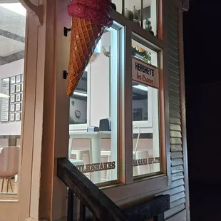 an ice cream shop at night