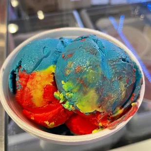 a bowl of colorful ice cream