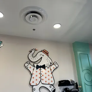a cartoon dog on the wall