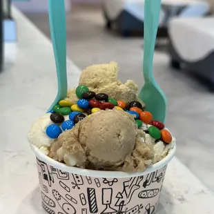 a scoop of ice cream with m &amp; m&apos;s