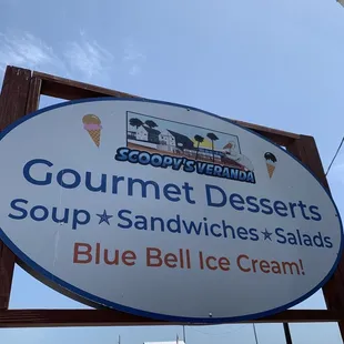 a sign for gourmet desserts