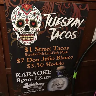 a sign for a mexican taco restaurant
