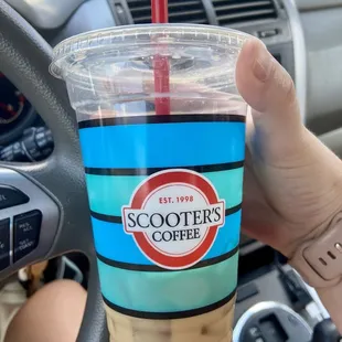 Medium iced Carmel Latte w/ Almond Milk