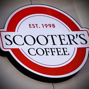 a red and white sign