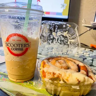 a cup of coffee and a sandwich