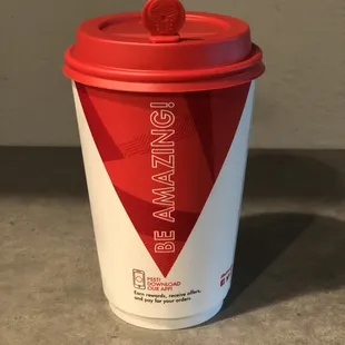 a red and white cup