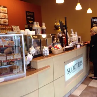 a woman and a child at the counter