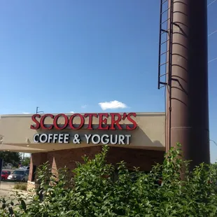a sign for a coffee and yogurt