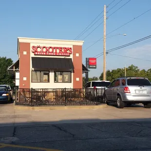 cars parked in front of the building