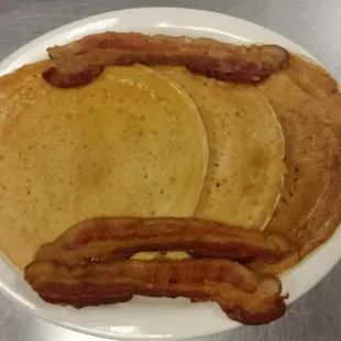 Tall Stack of Pancakes with Bacon