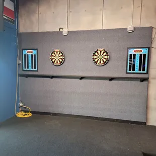 Darts any one? If you want to play, no charge,  and they provide darts for free. The stage is also set up for karaoke,  with lights.