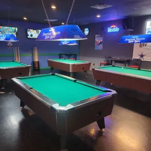 4 pool tables, with plenty of room.