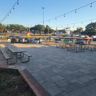 Large outdoor patio, to hang out, enjoy a beverage,  and  great food.