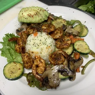 Blackened shrimp, sautéed veggies and rice