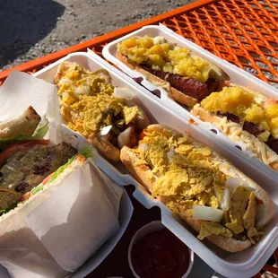 Left to right: chicken salad sandwich, long nacho dog, homewrecker - Hawaiian style