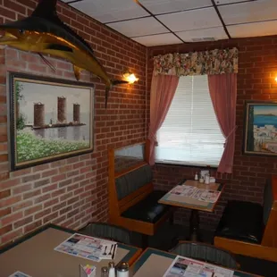 a brick wall and booths