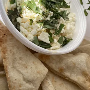 Hummus add garlic feta and basil