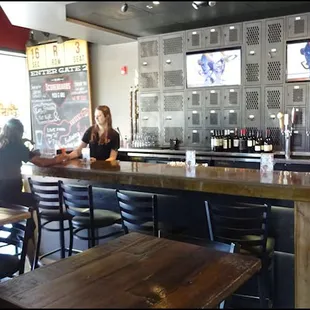 The bar is the centerpiece of the dining room, and offers beer on tap, wine, and any mixed drink that you care to order.