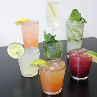 a variety of cocktails on a table