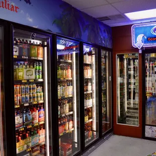 a row of refrigerators in a store
