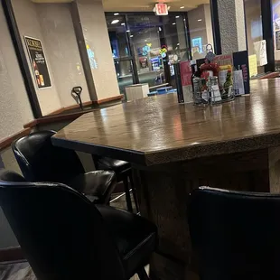 pub table/chairs near the entrance.