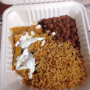 Enchilada with rice and beans. Should've been a burrito!