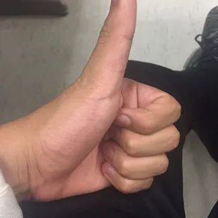 a person giving a thumbs up