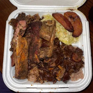 Oxtails &amp; jerk pork rib combo plate