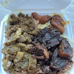 Meat combo: Curry Goat &amp; Oxtail w rice n peas and cabbage