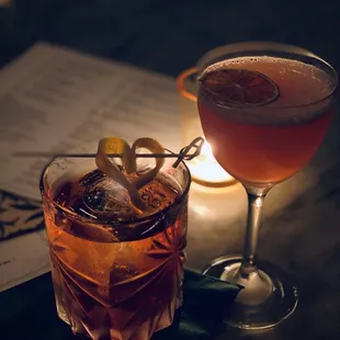 The cocktail in front is "Three Times a Lime" and the second cocktail is "Blade Runner."