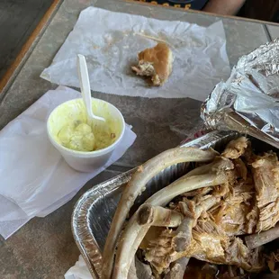 Bbq sandwich and potato salad with side of ribs