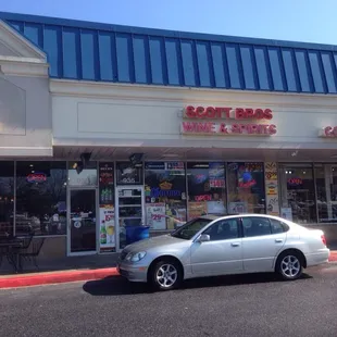 a car parked in front of the store