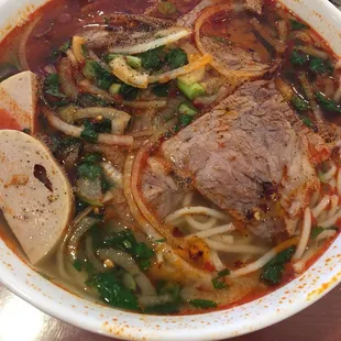 a bowl of beef noodle soup
