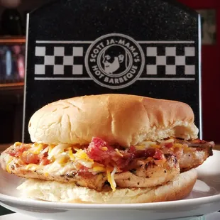 a chicken sandwich on a plate