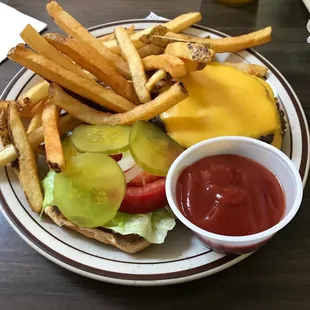 a plate of fries and a cheeseburger