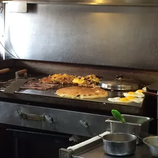 a large grill with food on it