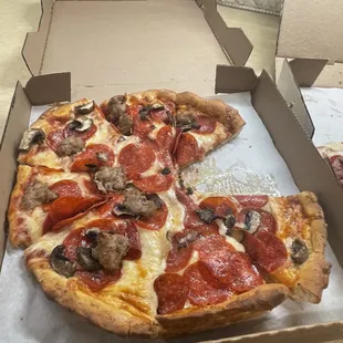 Pepperoni, mushroom and sausage pizza
