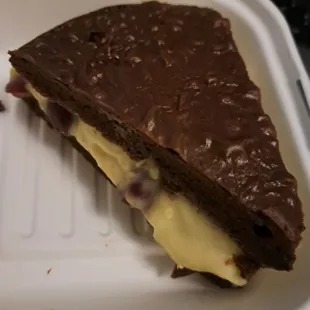 Chocolate cassata cake with custard and berries